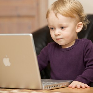 image of a child at a computer